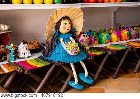 Raquira, Colombia - February 2021. Beautiful Handmade Yute Dolls In The Small Town Of Raquira.the Ci