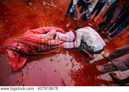 Barsana, Uttar Pradesh, India February 12 2021: Indian Ordinary Man Taking Ashirvaad Or Blessing Fro