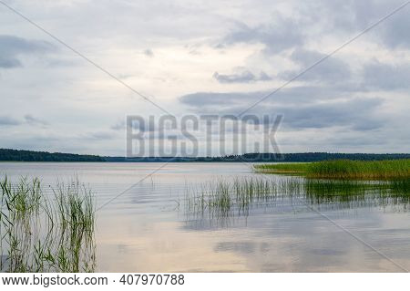 Usmas Lake In Latvia. Beautiful Natural Waterscape. Scenic View With Refrection. Summer Lake On Even