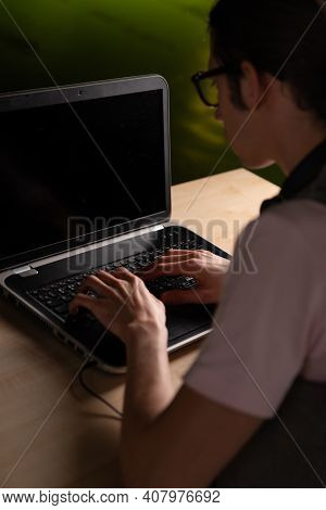 Write Code And Learn Programming Languages. A Student Or Specialist Is Doing A Project.