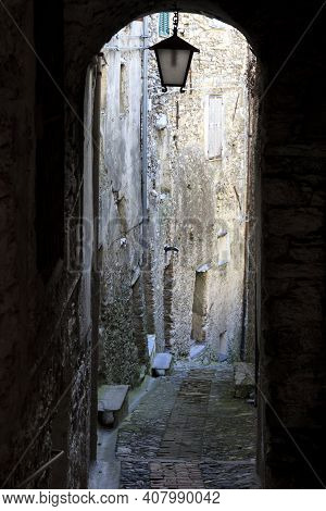 Triora (im), Italy - February 15, 2017: A Small Path Through The Houses In The Witches Village Of Tr