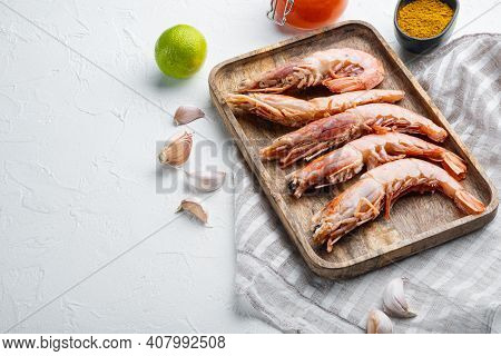 Raw Red Argentinian Prawns Set, On Wooden Tray, On White Background , With Copyspace  And Space For 
