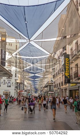 People Walking On Preciados Street, In Madrid, Spain