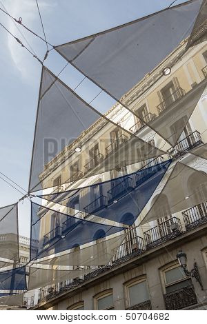 Detail Of Color Flags In Preciados Street, In Madrid, Spain