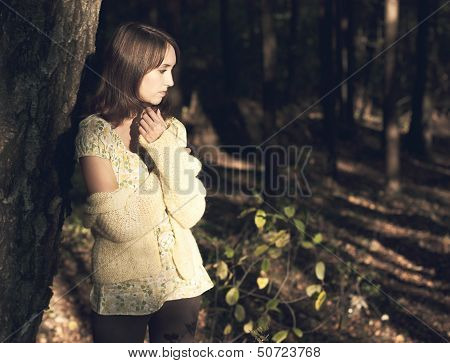 Portrait of Woman in Autumn Forest