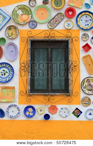 Artisan's Wall Of Handpainted Plates