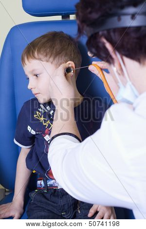 Medical Otitus Examination Of A Child At A Ear Nose Throat Doctor