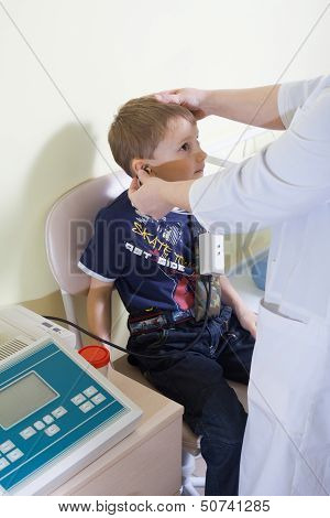 Medical Otitus Examination Of A Child At A Ear Nose Throat Doctor