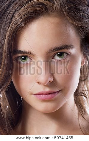Closeup Portrait Of A Teenage Girl Isolated On White