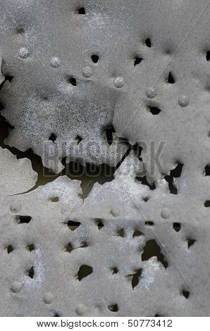 Damaged Metallic Background Texture With Holes