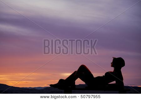Silhouette Lay Back Cowgril Outdoors