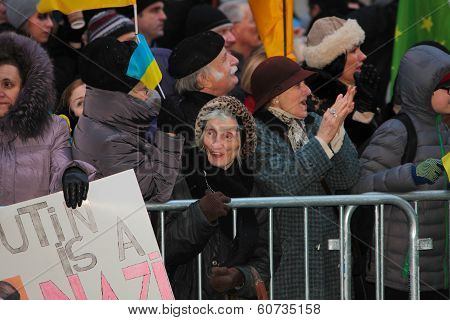 Elderly woman in front of Russian consulate