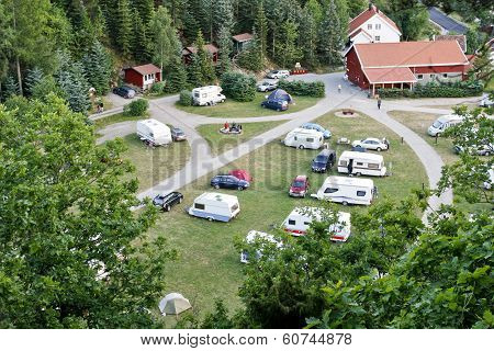 SØRLANDET, NORWAY - JUNE 30. Caravans, campers and buildings on June 30, 2010 in Sørlandet, Norway.
