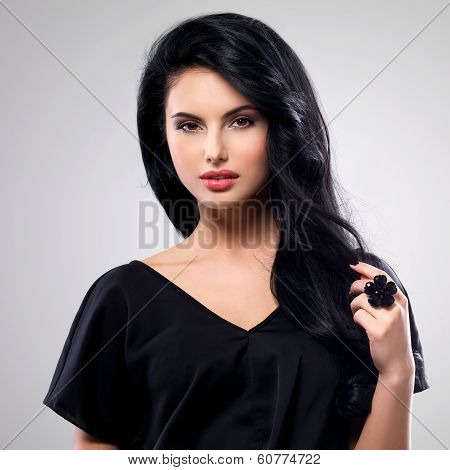 Portrait  Of An Young Woman With Long  Hair.