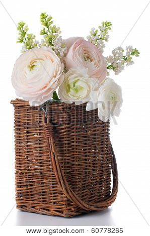 Buttercups And White Lilac In A Wicker Basket