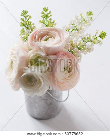 Bouquet Of Flowers In Can