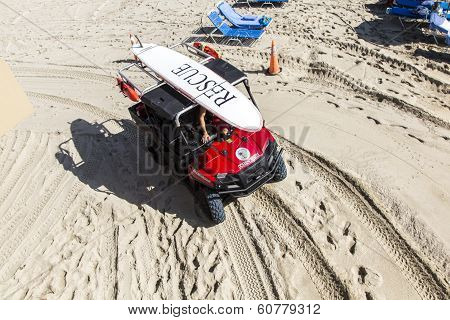 Ocean Rescue Team On Their Way To The Lifeguard Towers