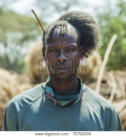 Traditionally Dressed Man From Tsemay Tribe. Most Omo Valley People Maintain Their Traditional Way O