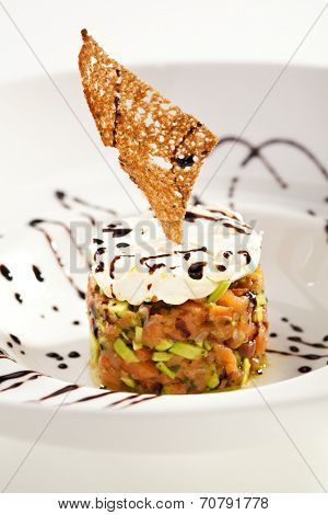 Salmon and Avocado Tartare. Topped with Cream Cheese and Crispy Bread