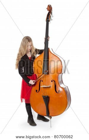 Young Girl Plays Double Bass In Studio