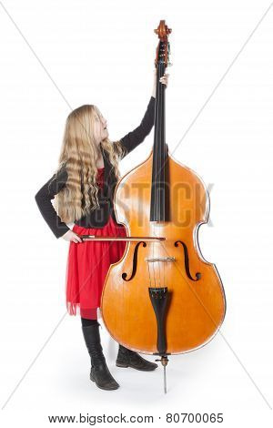 Young Girl Plays Double Bass In Studio