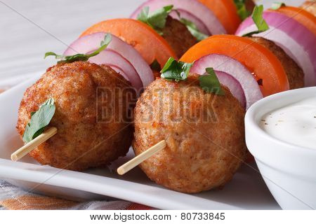 Meatballs On Skewers With Sauce On A Plate Macro, Horizontal