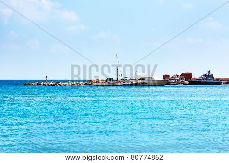 Mediterranean sea harbor with white motor yachts