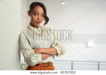 Portrait of African American businesswoman inside office building