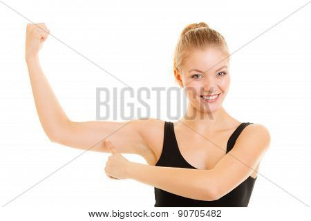 Fitness Woman Showing Energy Flexing Biceps Muscles.