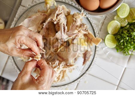 Shredded chicken for the ingredient for Soto, the traditional Indonesian chicken soup