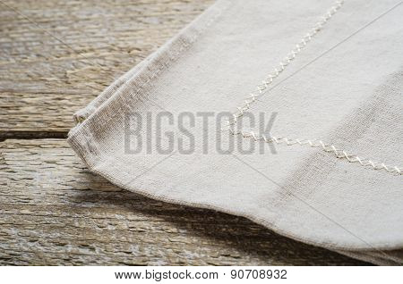 natural beige cotton cloth on wooden table