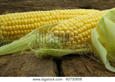 Large, Mature, Young Corn On The Wooden Background