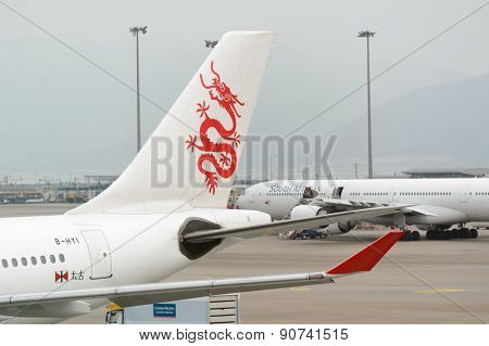 HONG KONG - MARCH 09, 2015: Dragonair aircraft. Hong Kong Dragon Airlines Limited, operating as Dragonair, is an international airline headquartered in Hong Kong