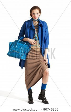 Fashion model pose on light background