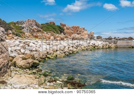 Multi-colored Rocks At The Harbor In Kleinmond.
