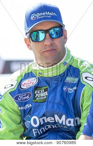Richmond, VA - Apr 24, 2015:  Elliott Sadler (1) watches his crew work during a practice session for the ToyotaCare 250 at Richmond International Raceway in Richmond, VA.