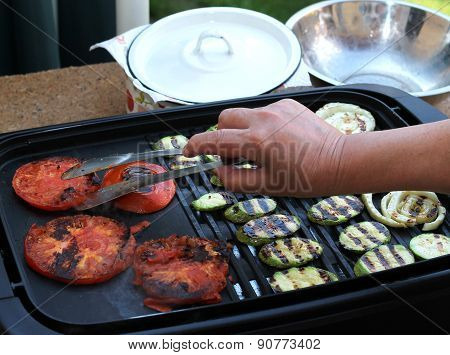 Women's Hand, Grilling Vegetables