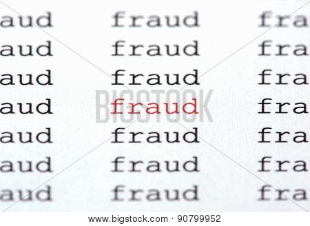 Typewritten Word Fraud In Red On White Paper