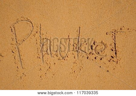 The Word Phuket Written On Sand
