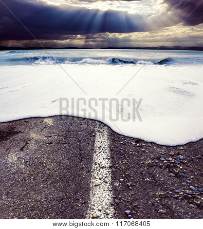 Road and sea.Sea storm concept