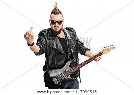 Young punk rocker playing electric guitar and showing his middle finger isolated on white background