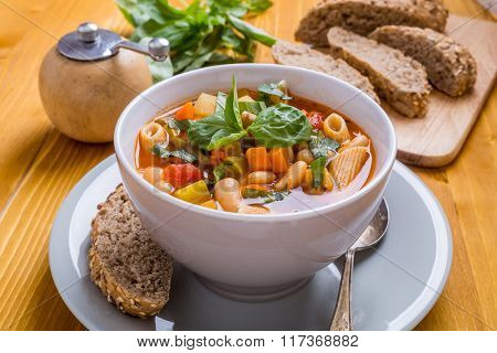 Bowl of Minestrone Soup with Pasta, Beans and Vegetables