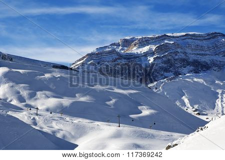 Ski Resort And Sunlight Rocks At Evening