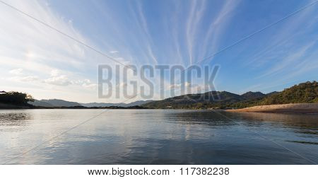 View pictures as a boat in the middle of the Mekong River in Thailand.