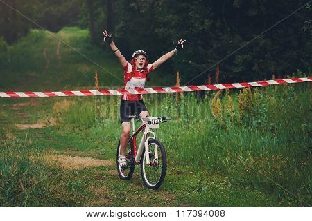 Young Woman Wins The Race Crossing Finish Line
