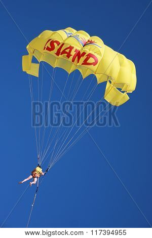 SUS, TUNISIA - OCTOBER 16: The person flies on the parachute on October 16, 2010 in Sus, Tunisia