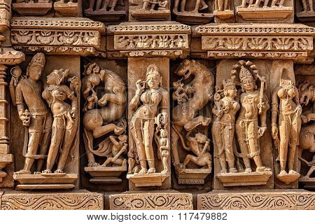 Stone carving bas relief sculptures on Adinath Jain Temple, famous indian tourist site Khajuraho, Madhya Pradesh, India