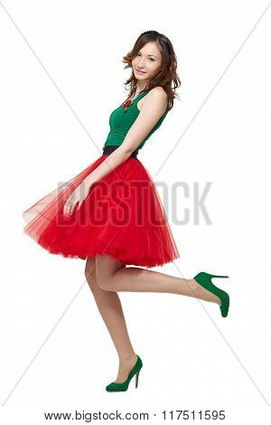 Smiling teenage girl in red skirt