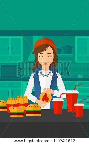 Woman suffering from heartburn.