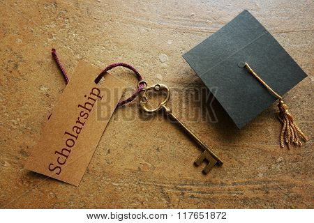 Scholarship Key And Cap